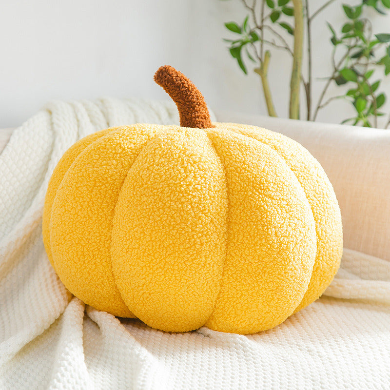 Yellow pumpkin pillow